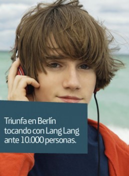 Portrait of a boy listening 

to headphones